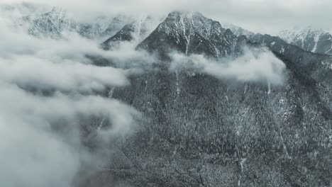 drone footage of  winter carpathian mountains, sinaia romania