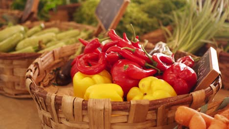 fresh peppers and vegetables at a farmers market