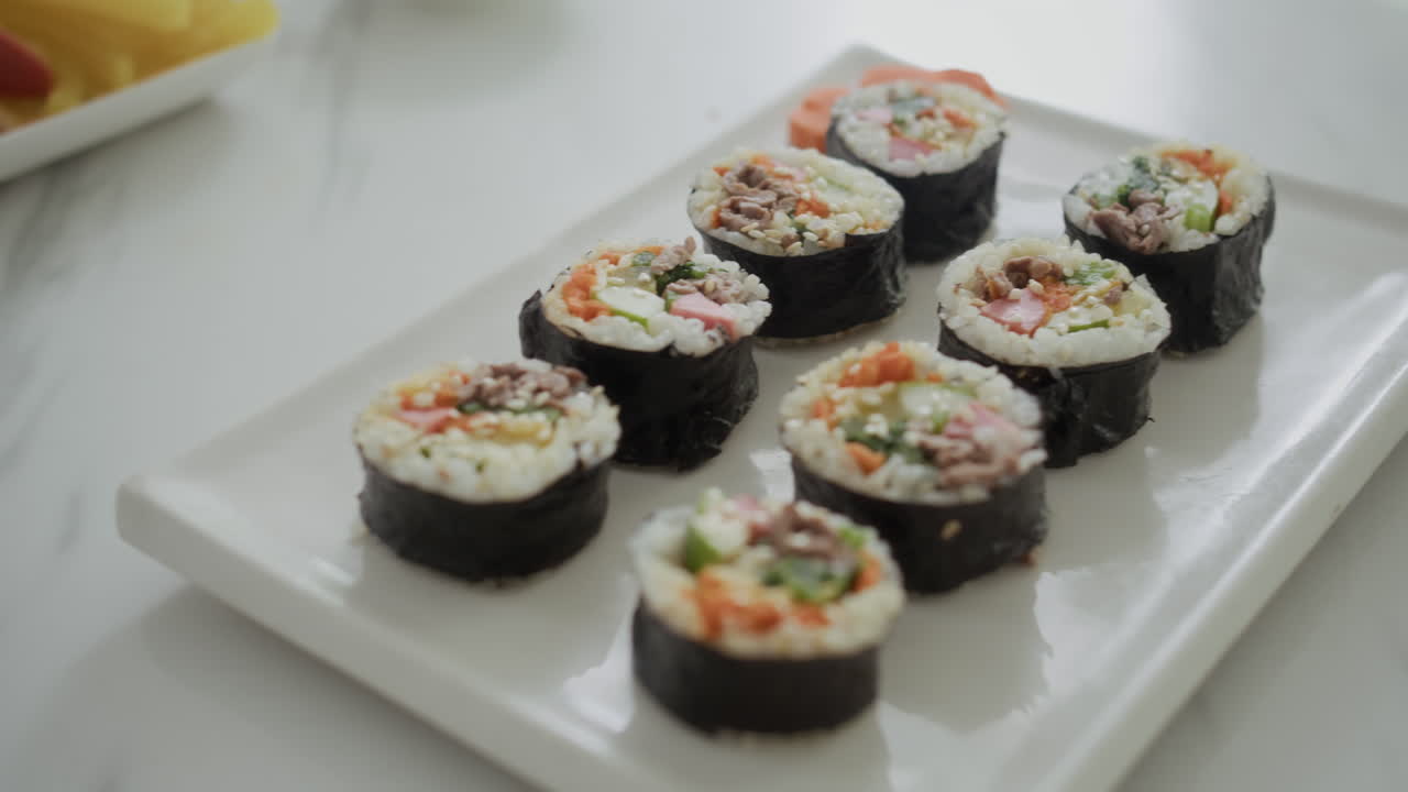 Homemade Sushi on White Plate