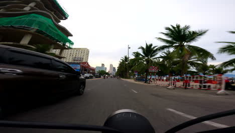 da nang, vietnam - riding a scooter through the coastal city - pov