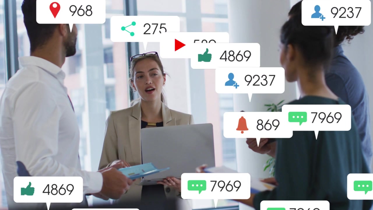 Presenter holding laptop starting demo, icons growing and covering team to show live engagement