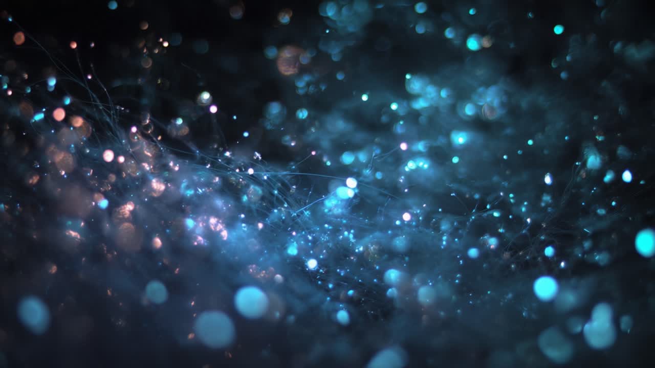 Mesmerizing Depths of Tranquil Light: A Journey Through a Hypnotic Web of Blue and Aqua Bokeh with Glimmering Twinkles Across the Frame