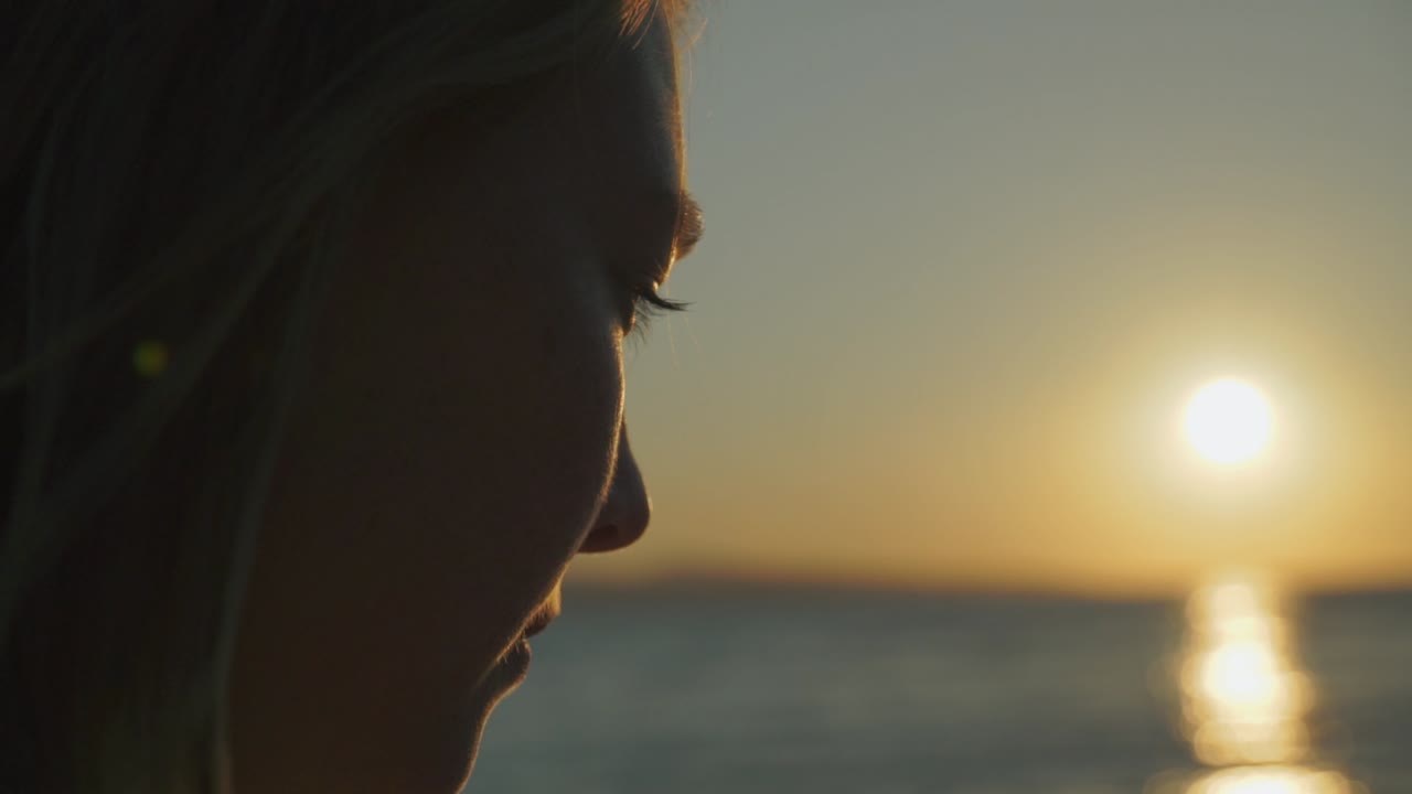 Woman Deep in Thought Contemplating Sunset