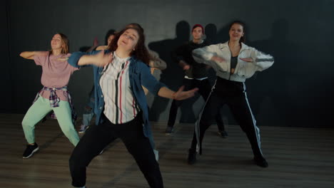 teenagers dancing in a studio