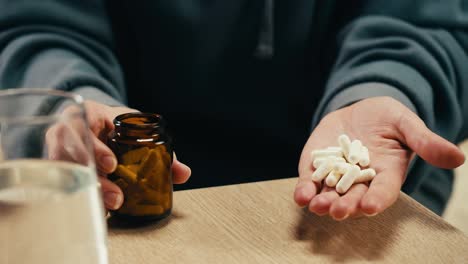 person taking pills