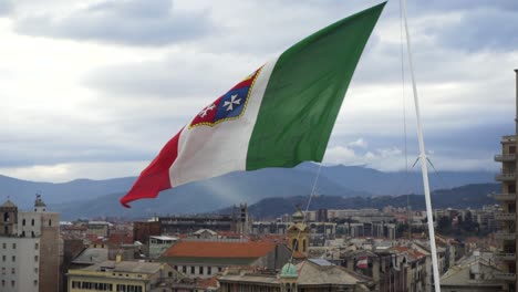 flag of san marino waving over a city