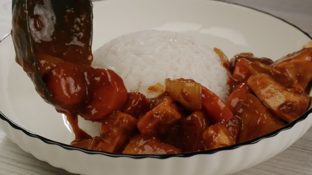 Japanese curry rice with fry pork Tonkatsu, Katsu Kare, Japanese breaded cooking dinner in restaurant, close up macro of asian food