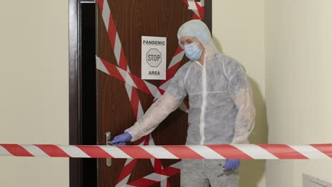 Doctor-in-medical-suit-visiting-patient-entrance-corridor,-sick-family-of-mother-and-child-girl-home