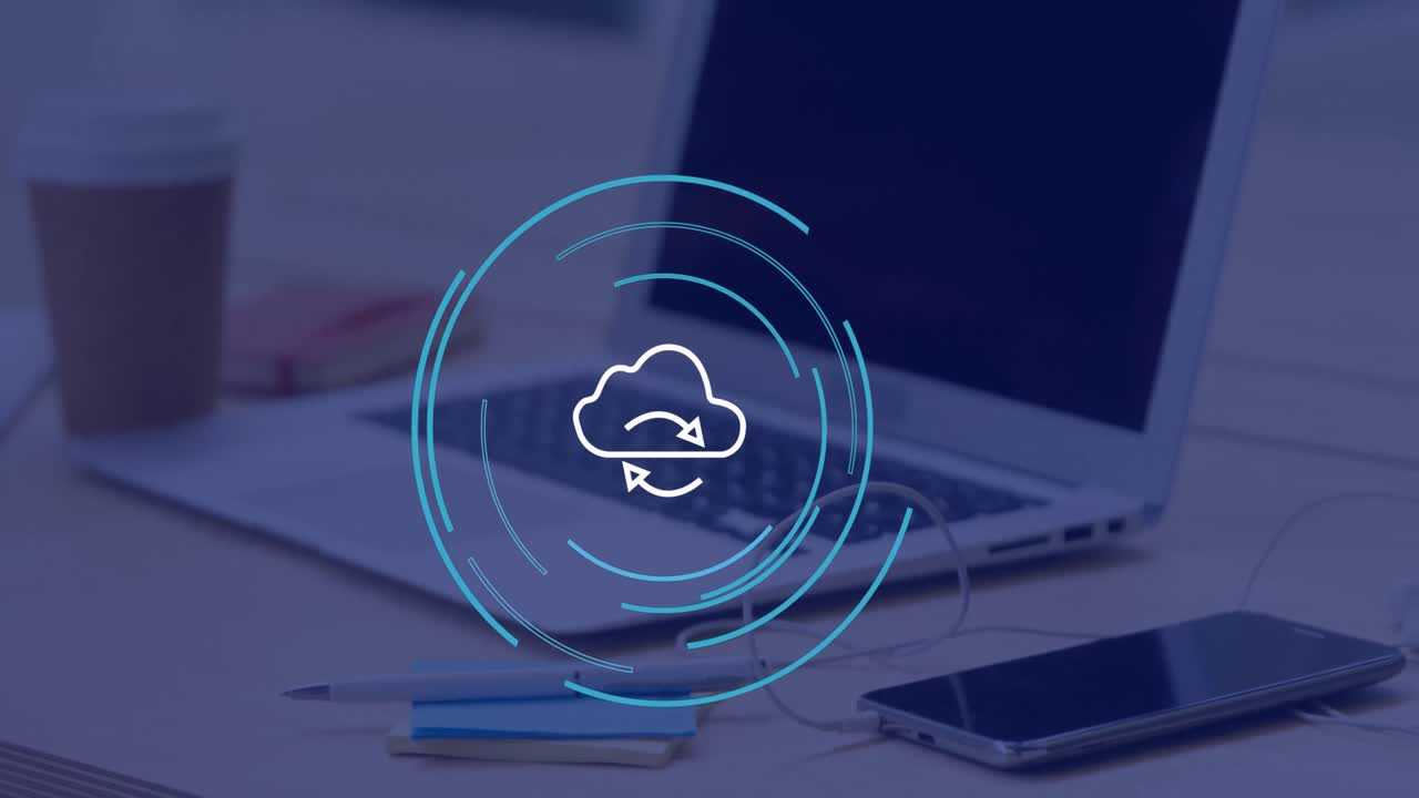 Animation of cloud icon over laptop in office