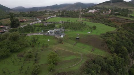 Armenia-aerial-retreats-from-Wings-of-Tatev-cableway-tram-car-on-cliff