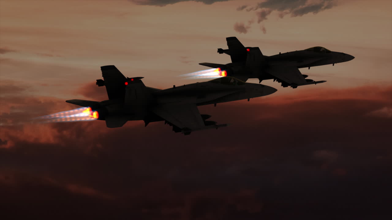 4K Aerial two F18 Hornet flying at sunset and rolling left
