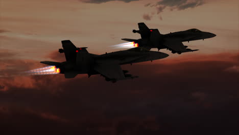 4k aerial two f18 hornet flying at sunset and rolling left