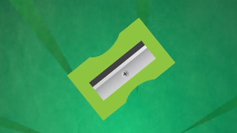 Animation-of-green-pencil-sharpeners-over-green-background