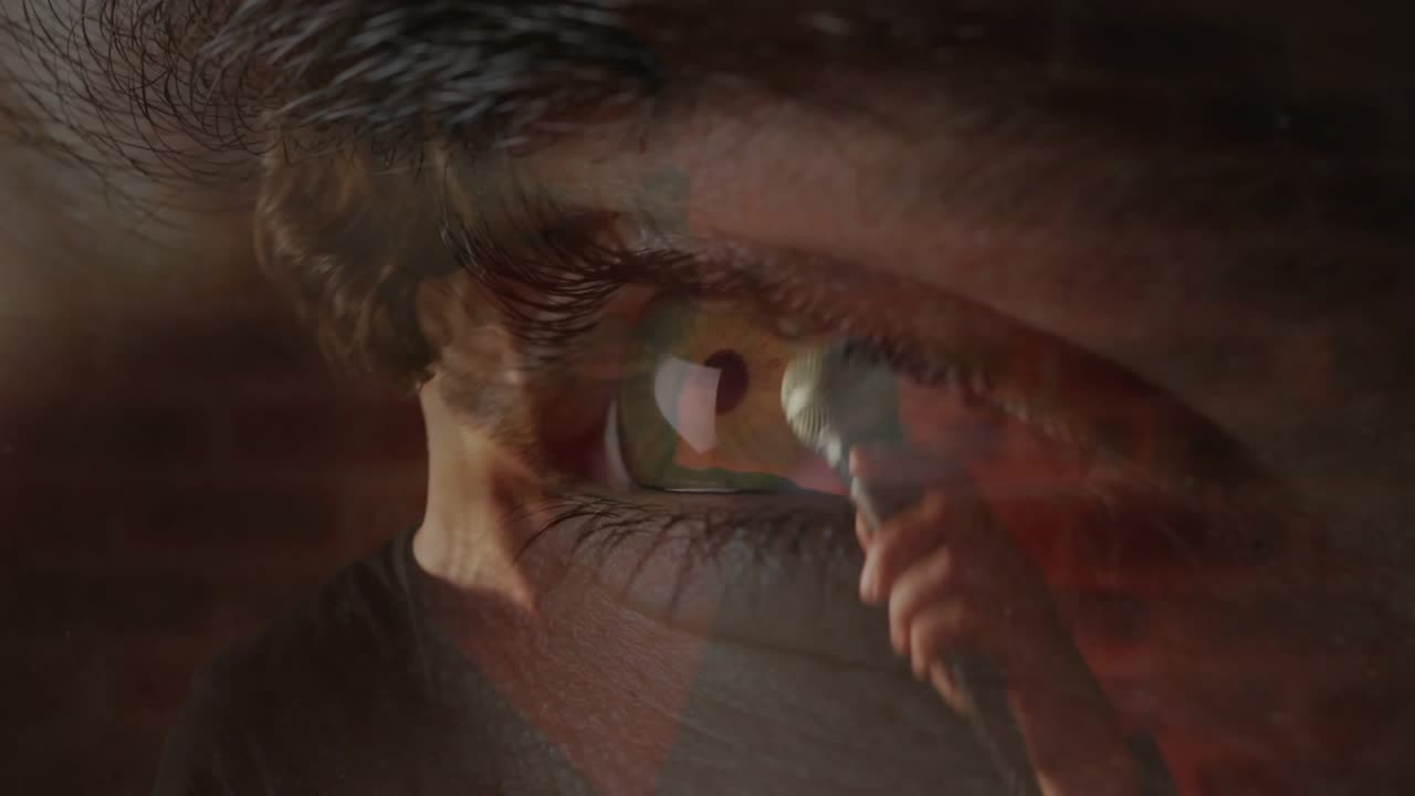 Male listener's eye filling view and reflecting singer bringing mic to lips singing performance
