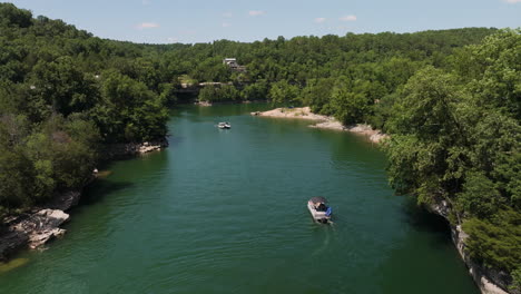 Amazing-serene-lake-landscape-in-Hogscald-Hollow-swimming-cove,-aerial,-dolly-in