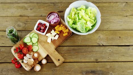 chopped vegetables on wooden table