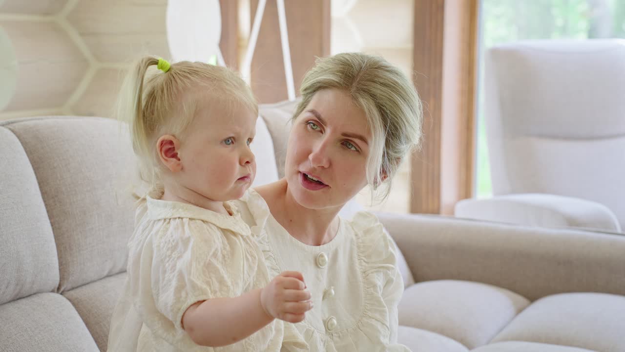 Mother and Daughter on Sofa