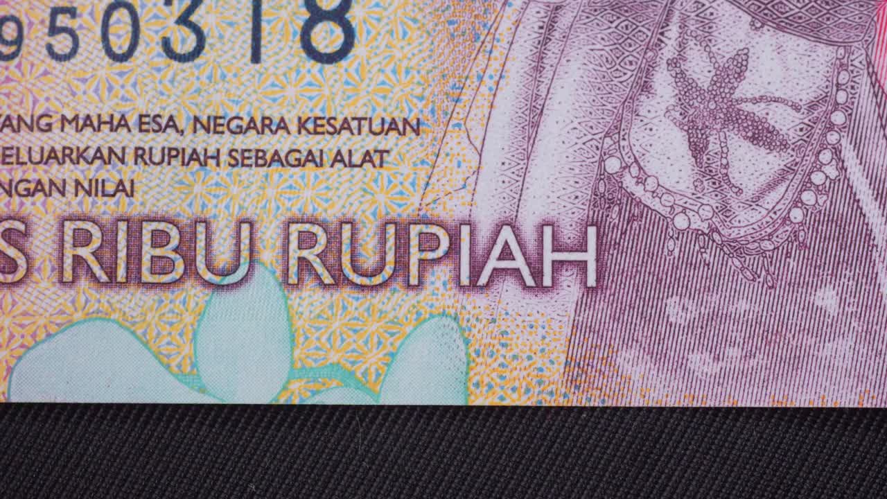 Macro shot of the Indonesian Rupiah, focusing on details of bill