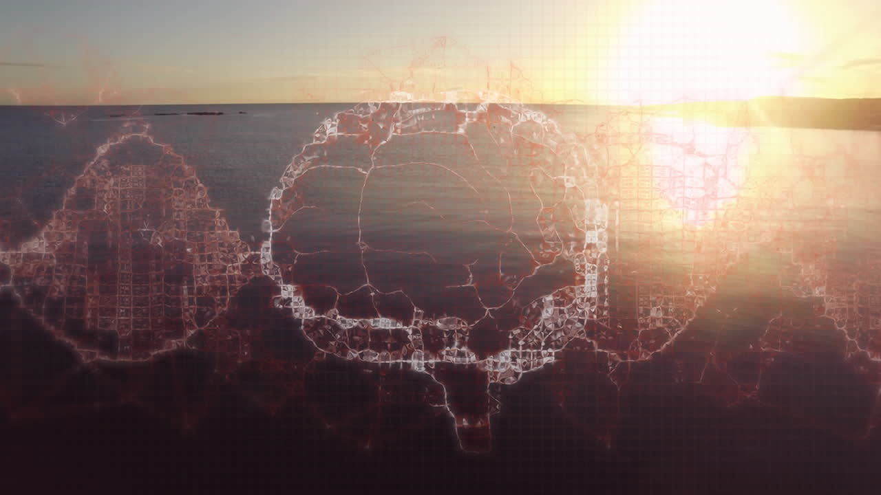 animación de un cerebro digital girando sobre el mar y el cielo al atardecer