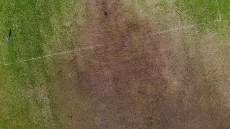 aerial of muddy soccer field lines