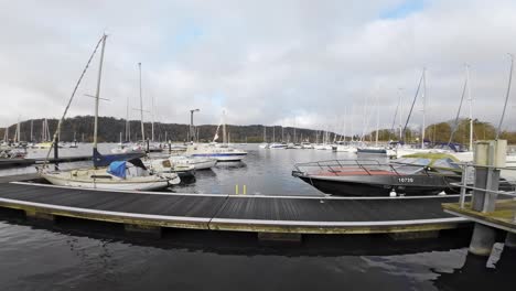 slow motion video boats, sailing ships, moored on the harbor of bowness-on-windermere