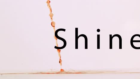 animation of shine text over liquid on white background