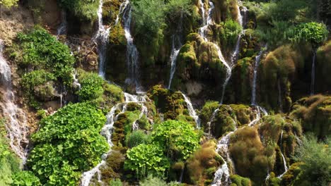 Aerial:-amazing-Sopotnica-waterfalls-cascading-over-Serbian-rocky-mountainside