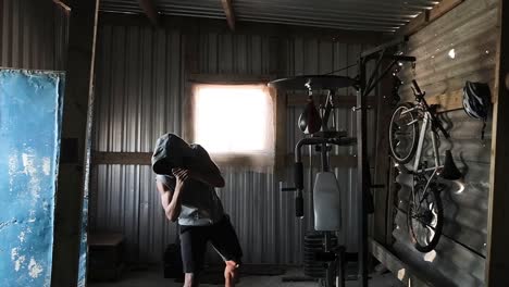 boxer practicing shadow boxing in the gym