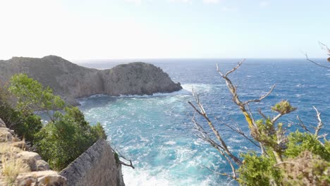 coastal view with rocky cliffs and waves