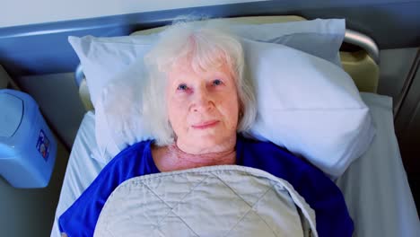 Senior-patient-relaxing-in-the-ward-4k