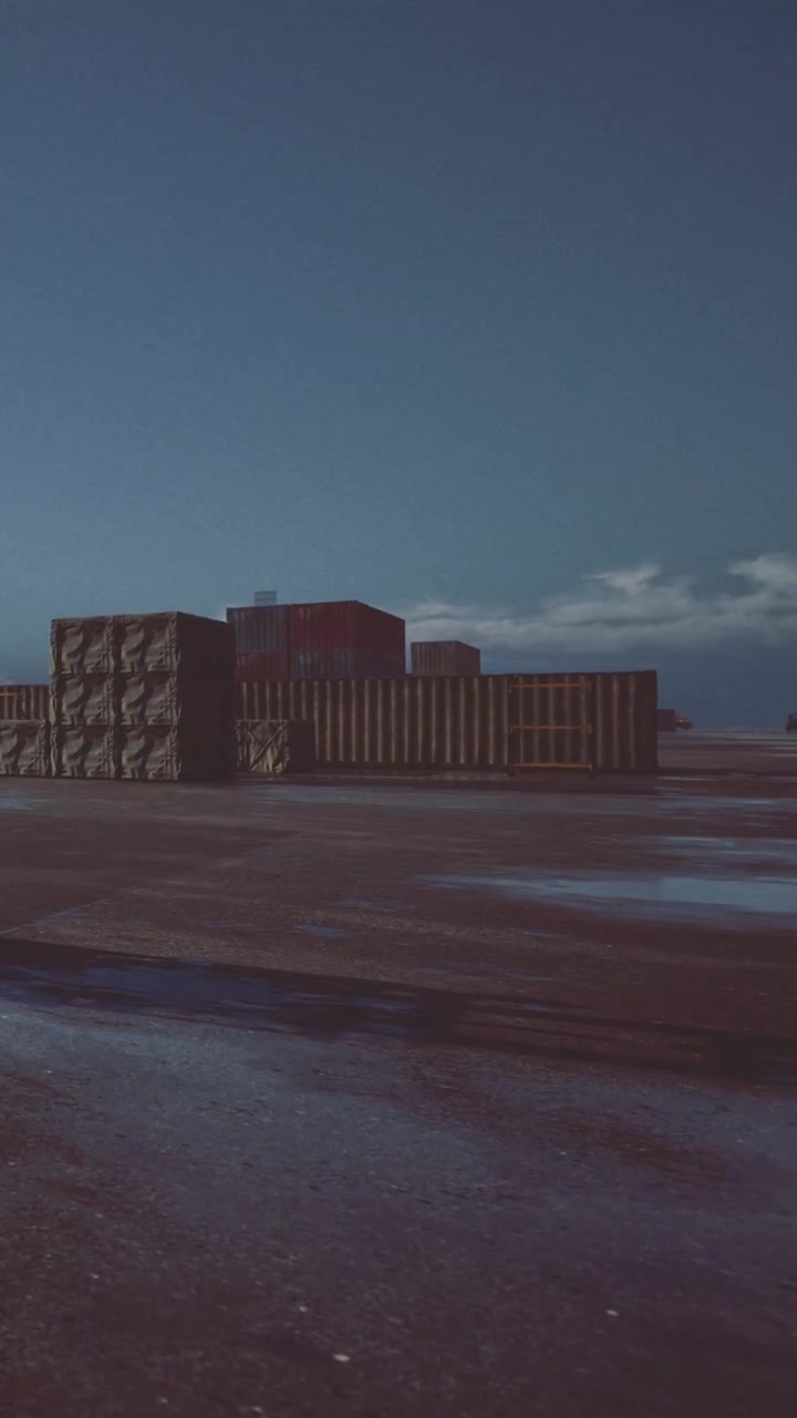 Container per spedizioni su un molo durante il giorno con cielo blu e nuvole