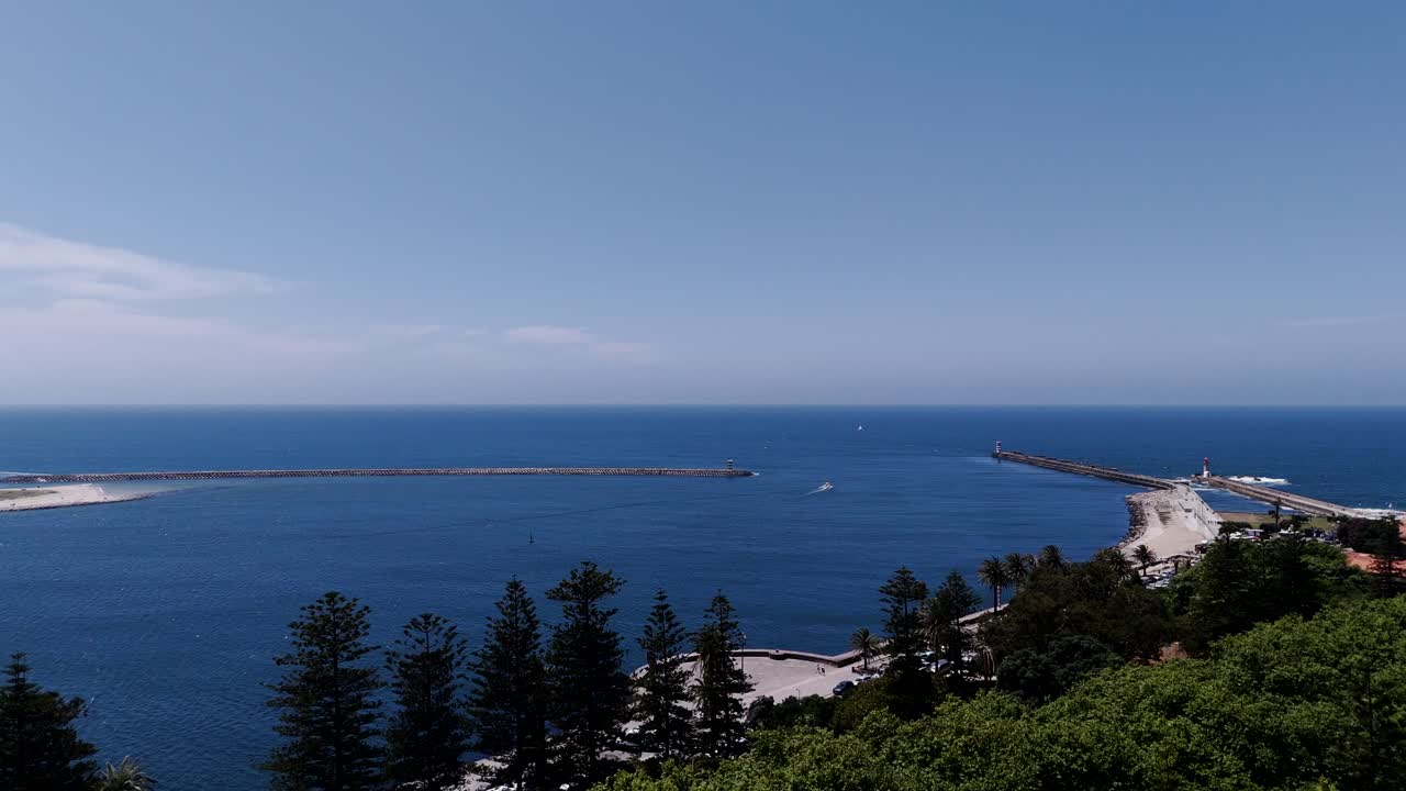 atlantic pierlines beneath the blue stillness of porto's foz