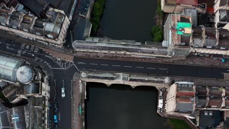 Cinematic-dolly-back-pan-up-drone-shot-of-Pulteney-bridge-central-Bath-UK