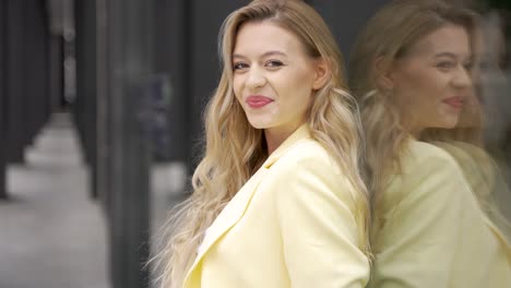 stylish woman in yellow jacket