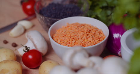 fresh food ingredients on wooden table in kitchen 8