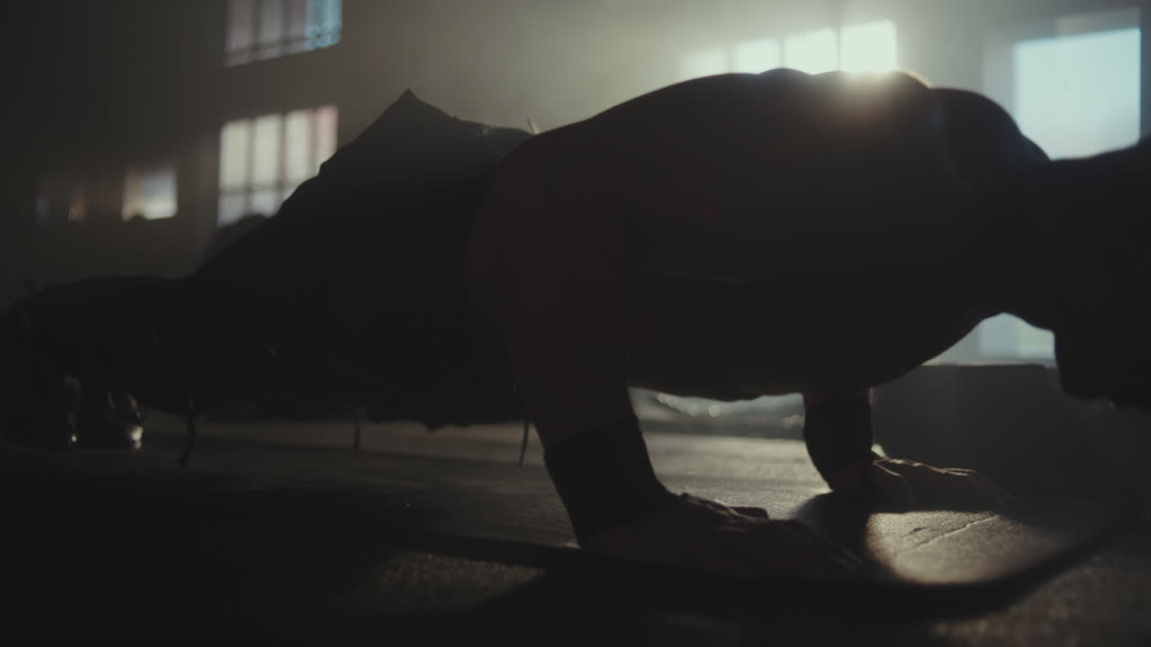 Man doing push-ups in a gym