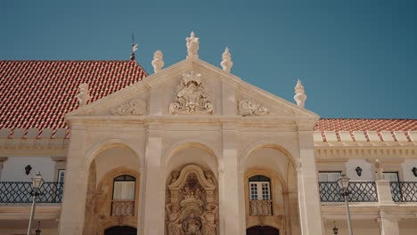 ornate facade of a historical building in coimbra, portugal