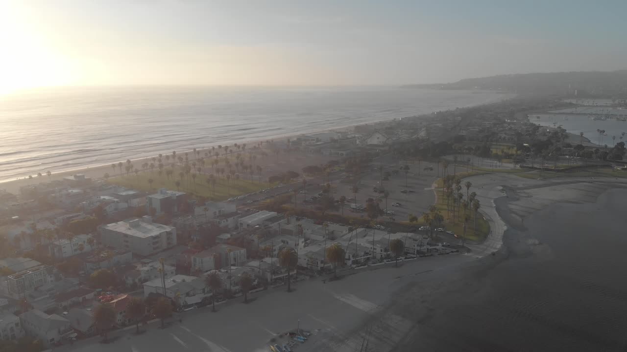 Aerial View of a Coastal City with Beach and Bay