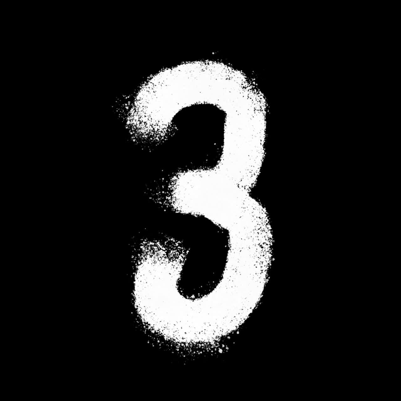 Numero 3 bianco con vernice spray su sfondo nero.