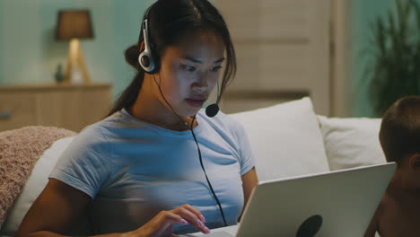 woman working from home with child