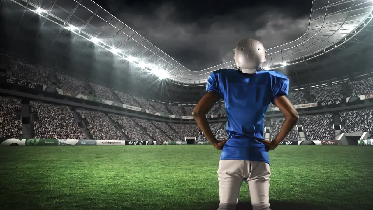 필드 에 서 있는 미국 축구 선수