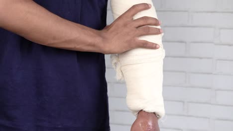 bandaged arm injury