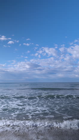 sea tide on beach in vertical