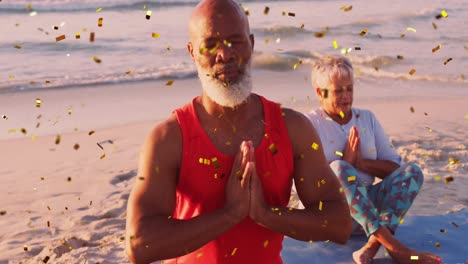 Animación-De-Confeti-Navideño-Sobre-Una-Pareja-Birracial-Mayor-Meditando-En-La-Playa