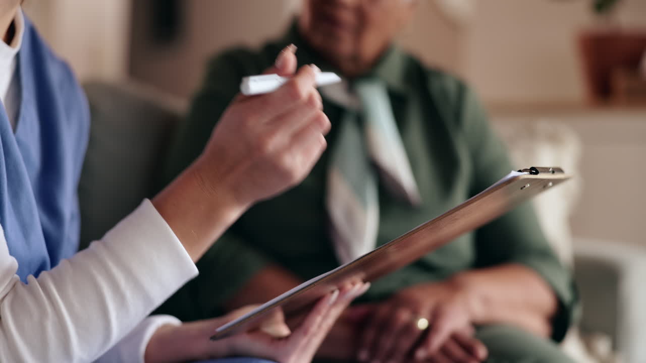 Nurse Consults with Patient