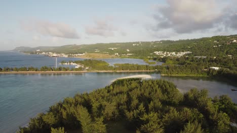 Aerial-view-of-fishing-bay-at-American-Memorial-Park,-Saipan,-Northern-Mariana-Islands