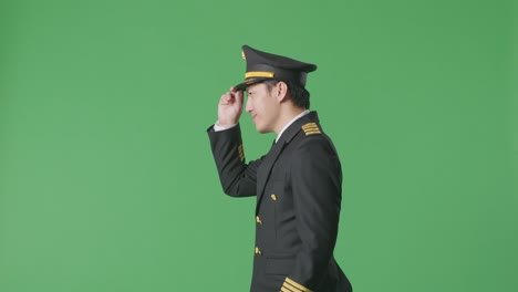 pilot walking on green screen