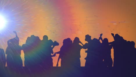 Animation-of-prismatic-spotlight-over-dancing-crowd-with-orange-background