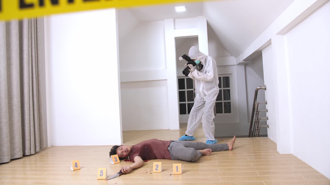 Forensic Taking Photo Of Victim. Crime Scene
