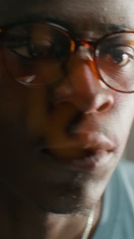 Close-up of a man wearing glasses